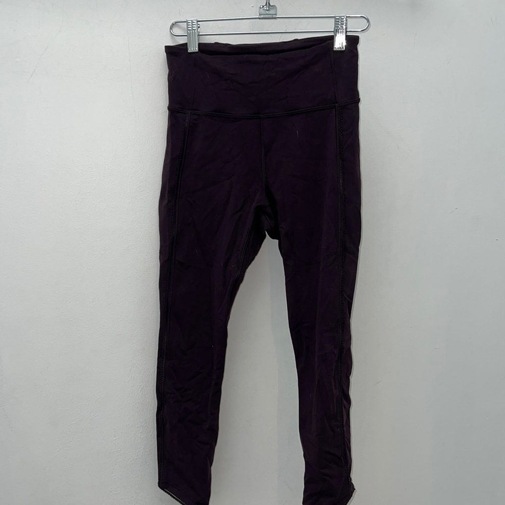 crop luon leggings in black cherry with mesh. Size 4! Gently worn 21in